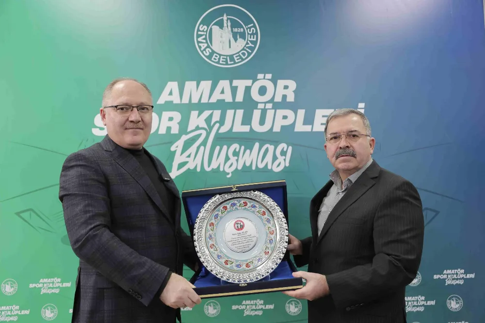 Spor dostu başkana teşekkür plaketi 